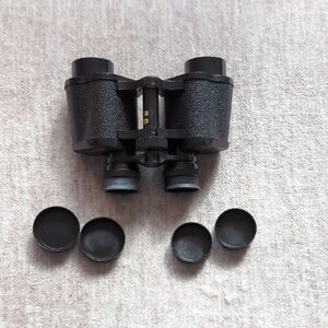 Sleek Black Binoculars with Caps